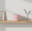 Okrasen cvetlični lonec Eva - roza mat umeščen v prostor